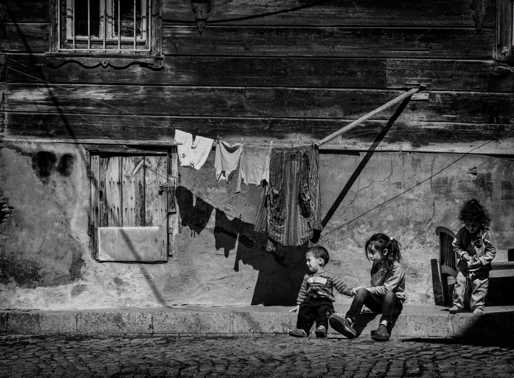 Children on Old Street by Ömer Ates Kızıltug — canvas wall art
