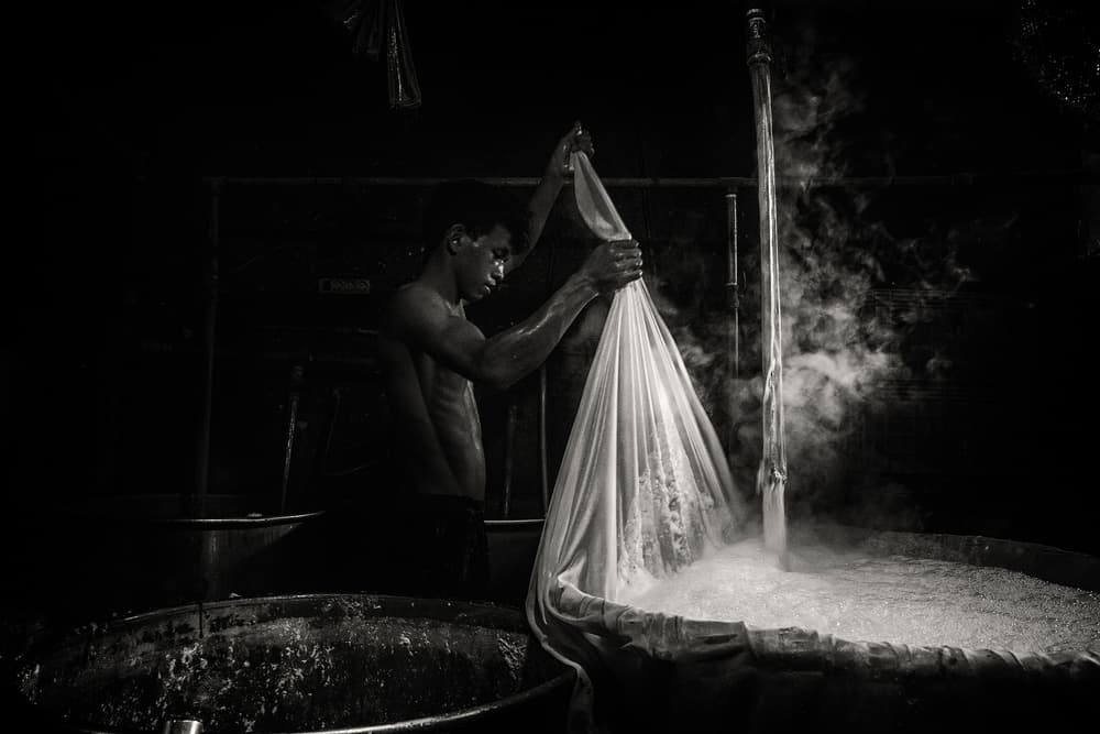 Textile Worker In Steam by Andi Halil — canvas wall art