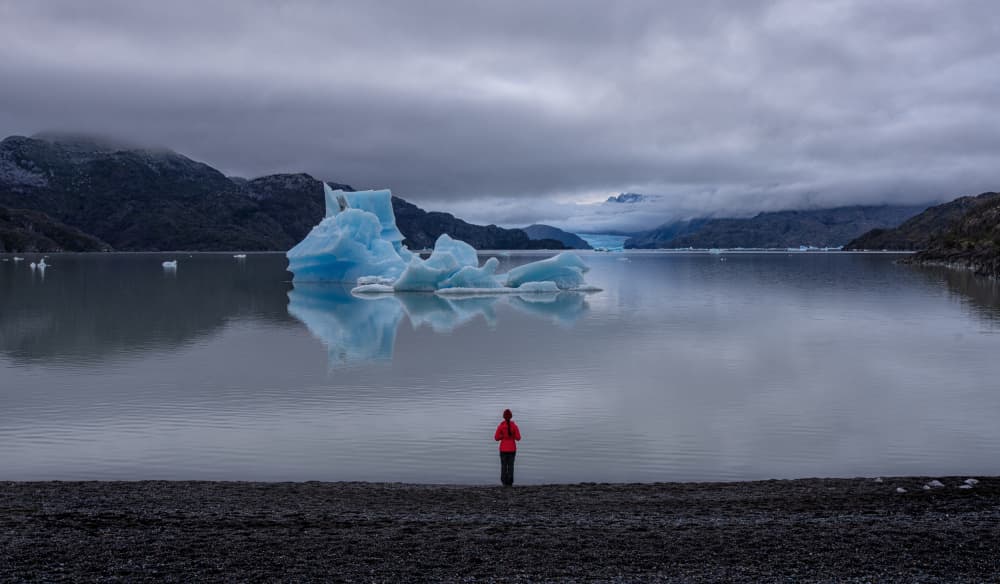 Red Jacket Iceberg Lake by April Xie — canvas wall art