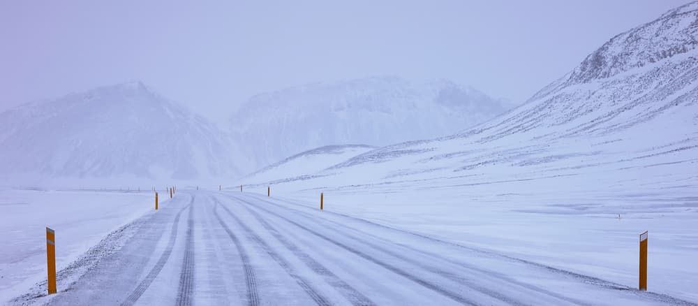 Serene Snowy Mountain Road by Julien Oncete — canvas wall art