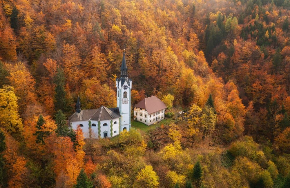 Golden Autumn Church by Ales Krivec — canvas wall art
