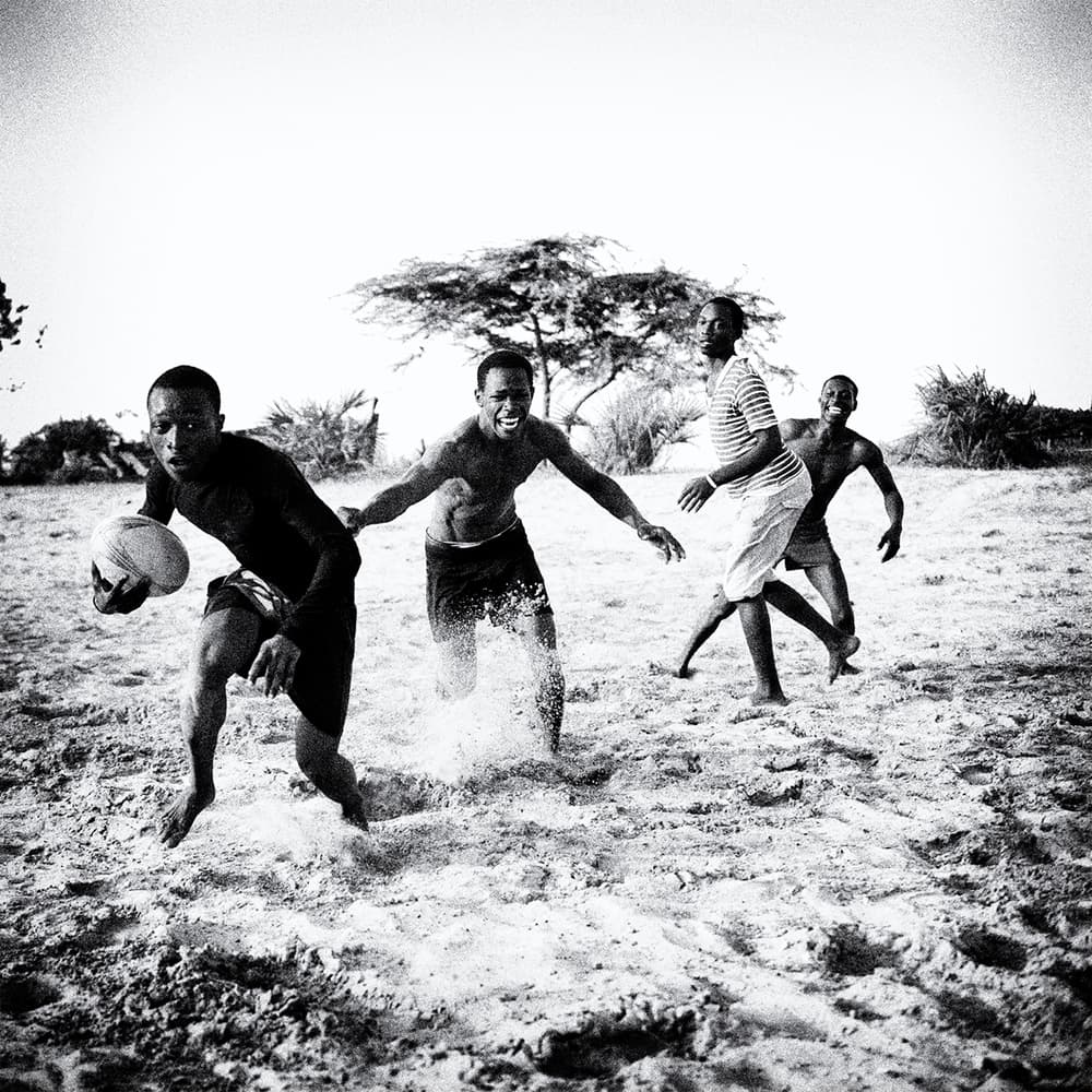 Beach Rugby Action by Marcel Rebro — canvas wall art