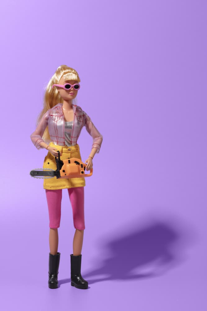 Fashion Doll with Chainsaw by Julia Ramiro — canvas wall art