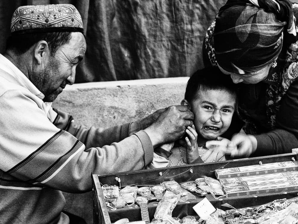 Crying Child Market Moment by BJ Yang — canvas wall art