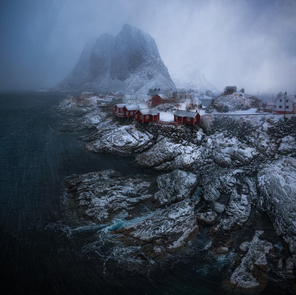 Snowy Coastal Red Huts by Stan Huang — canvas wall art