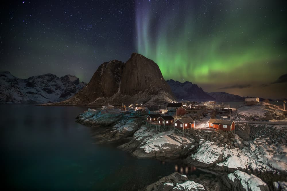 Aurora Over Snowy Village by Wim Denijs — canvas wall art