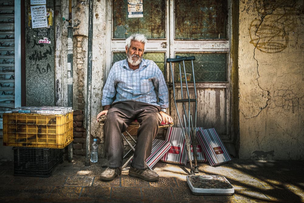 Street Vendor Resting by Marco Tagliarino — canvas wall art