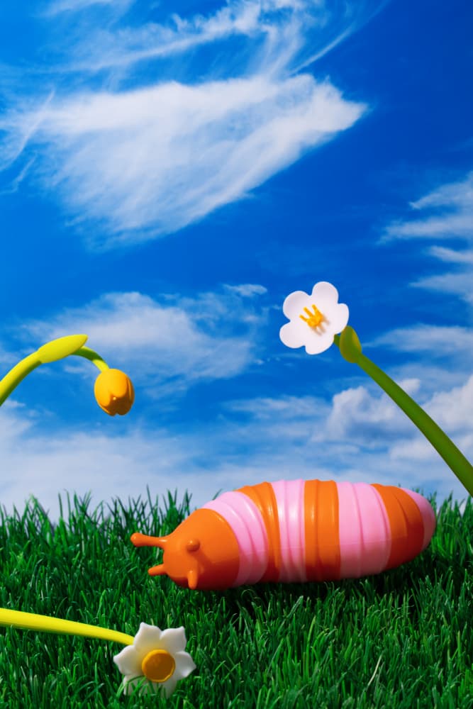 Playful Caterpillar Flowers by Julia Ramiro — canvas wall art