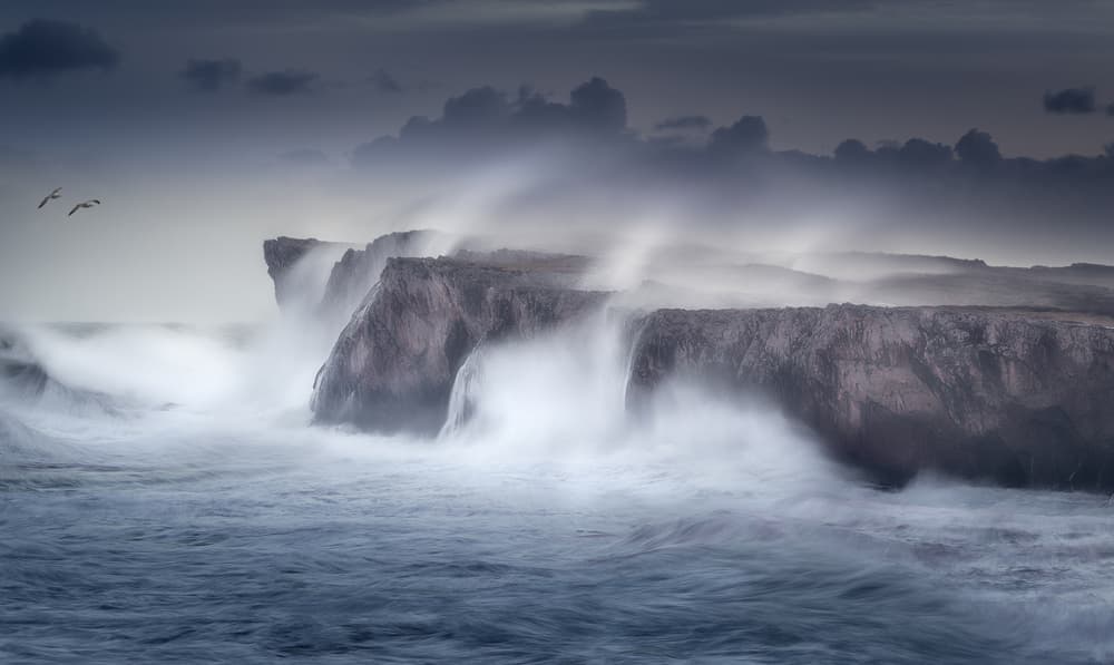 Crashing Ocean Cliffs by Juan I. Cuadrado — canvas wall art