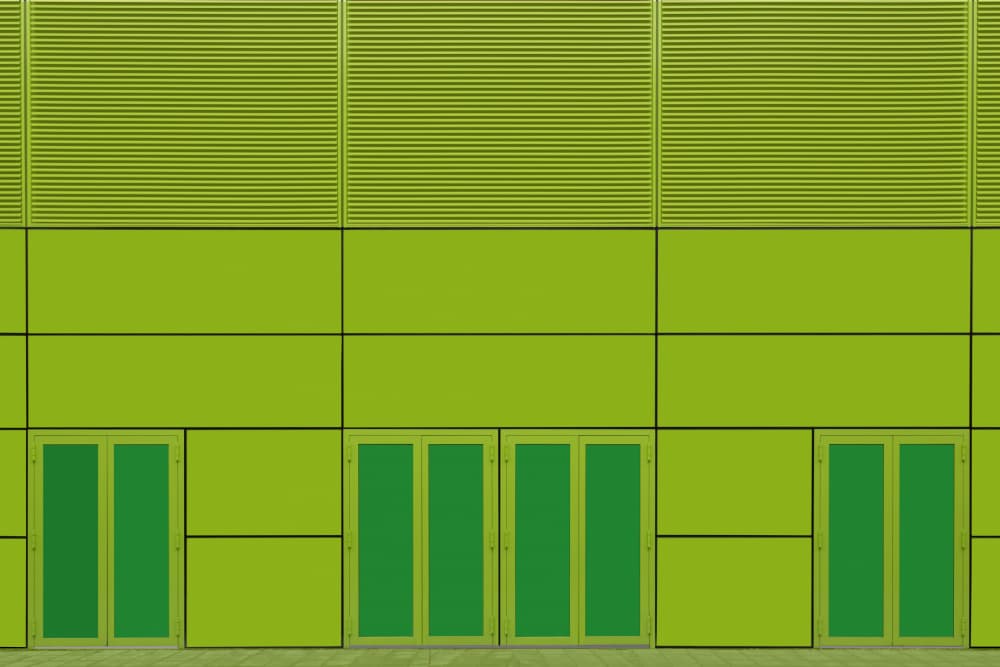 Vibrant Green Facade by Jan Niezen — canvas wall art