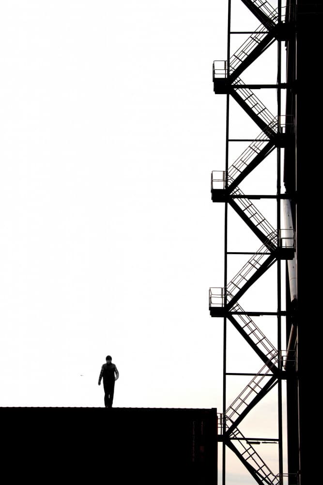 Solitary Rooftop Climb by Ramiz Sahin — canvas wall art
