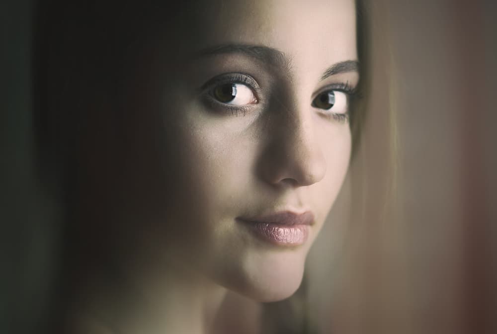 Mysterious Young Woman by Ildiko Neer — canvas wall art
