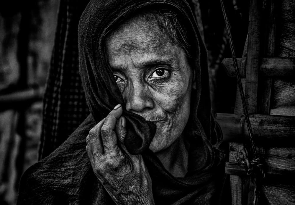 Pensive Older Woman by Joxe Inazio Kuesta Garmendia — canvas wall art