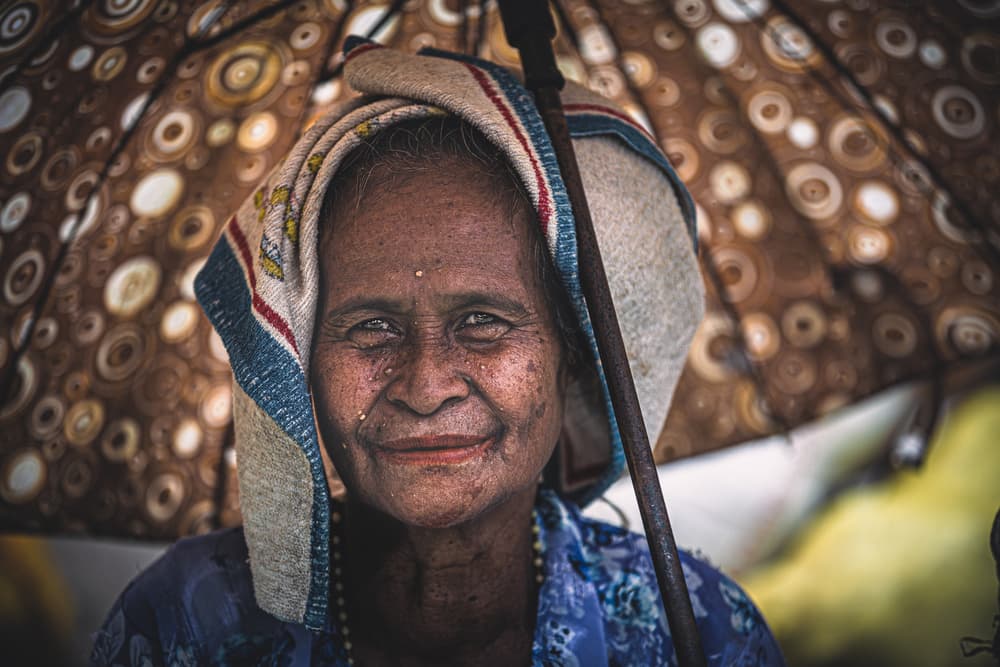 Smiling Elderly Woman by Marco Tagliarino — canvas wall art