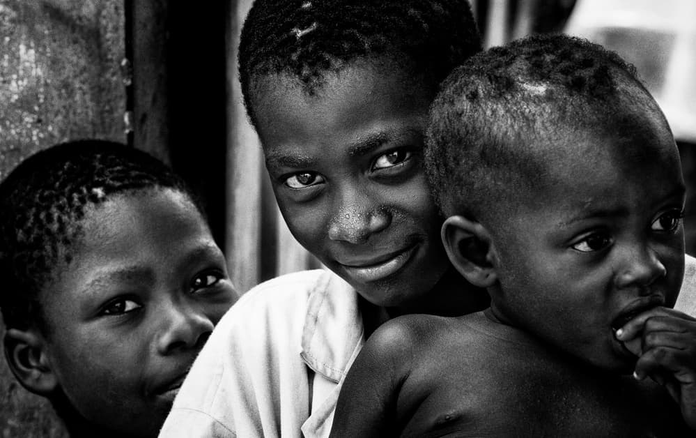 Smiling African Boys by Joxe Inazio Kuesta Garmendia — canvas wall art