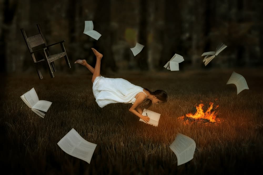 Girl Floating with Books by Joey Bangun — canvas wall art