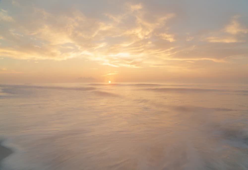 Peaceful Ocean Sunrise by Courtney Crane — canvas wall art