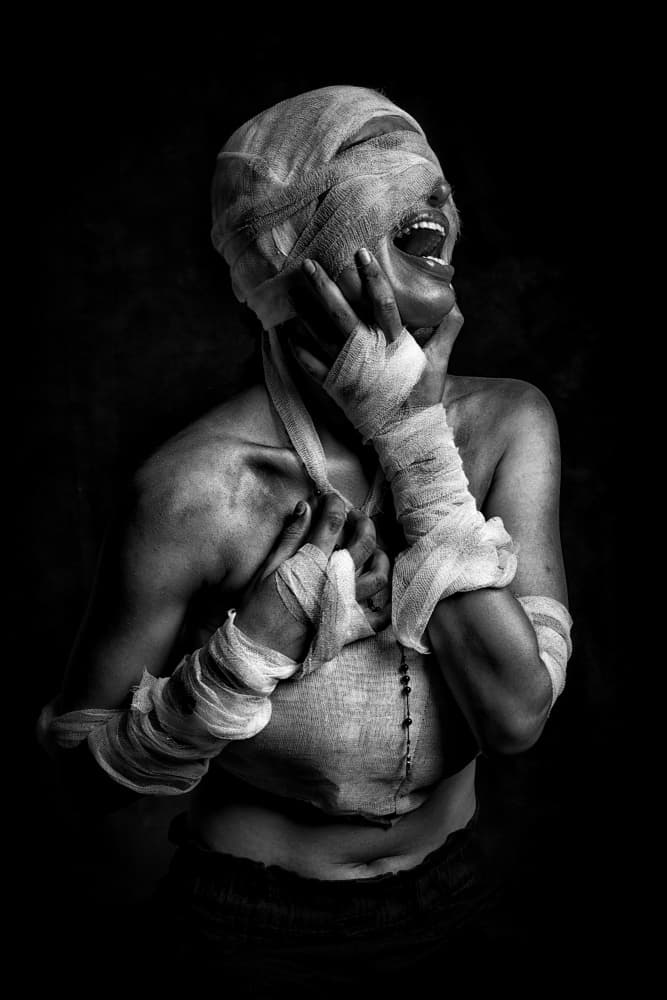 Wrapped in Anguish by Nilendu Banerjee — canvas wall art