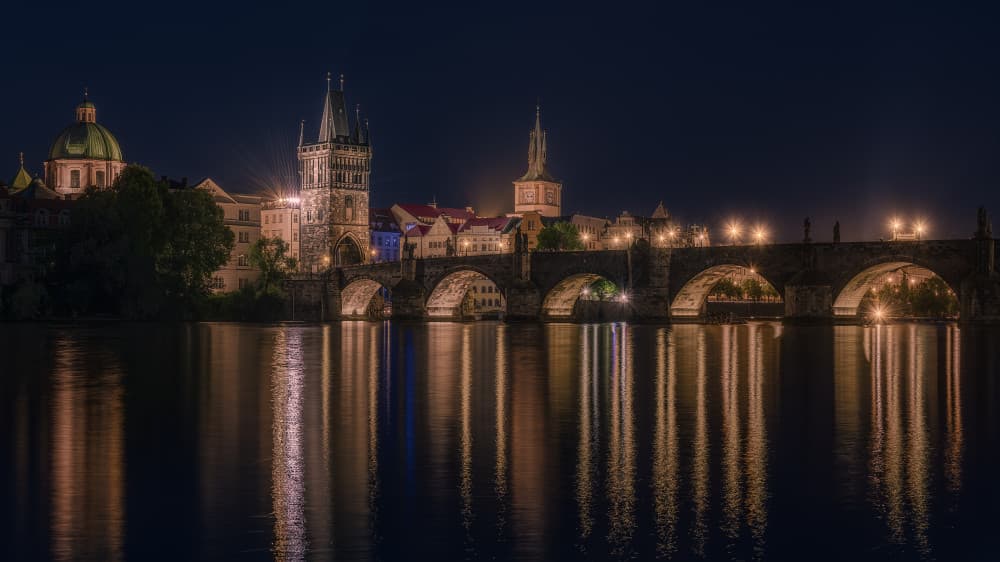 Charles Bridge Night Reflections by Paco Jimenez — canvas wall art