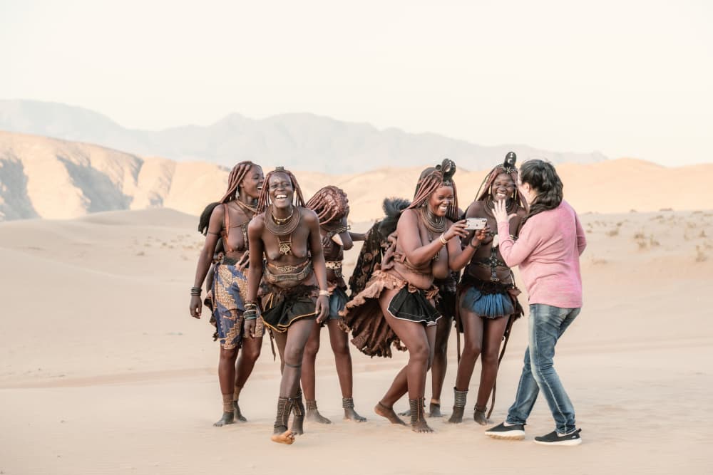 Himba Desert Laughter by Trevor Cole — canvas wall art