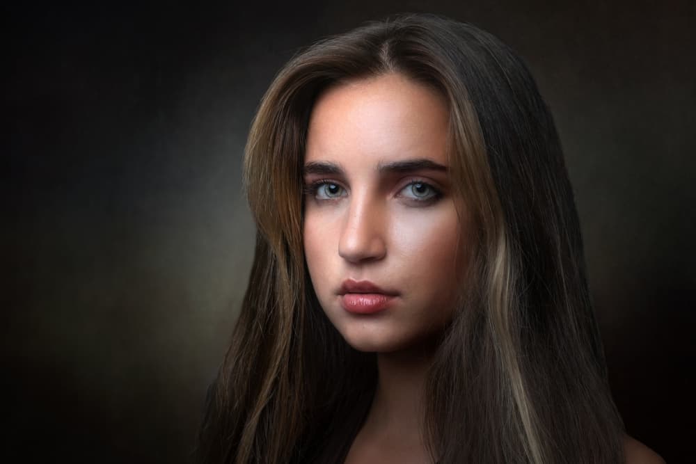 Serene Gaze Portrait by Luc Stalmans — canvas wall art