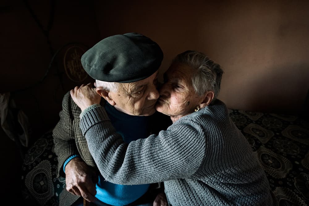 Tender Senior Kiss by Carlos Costa — canvas wall art