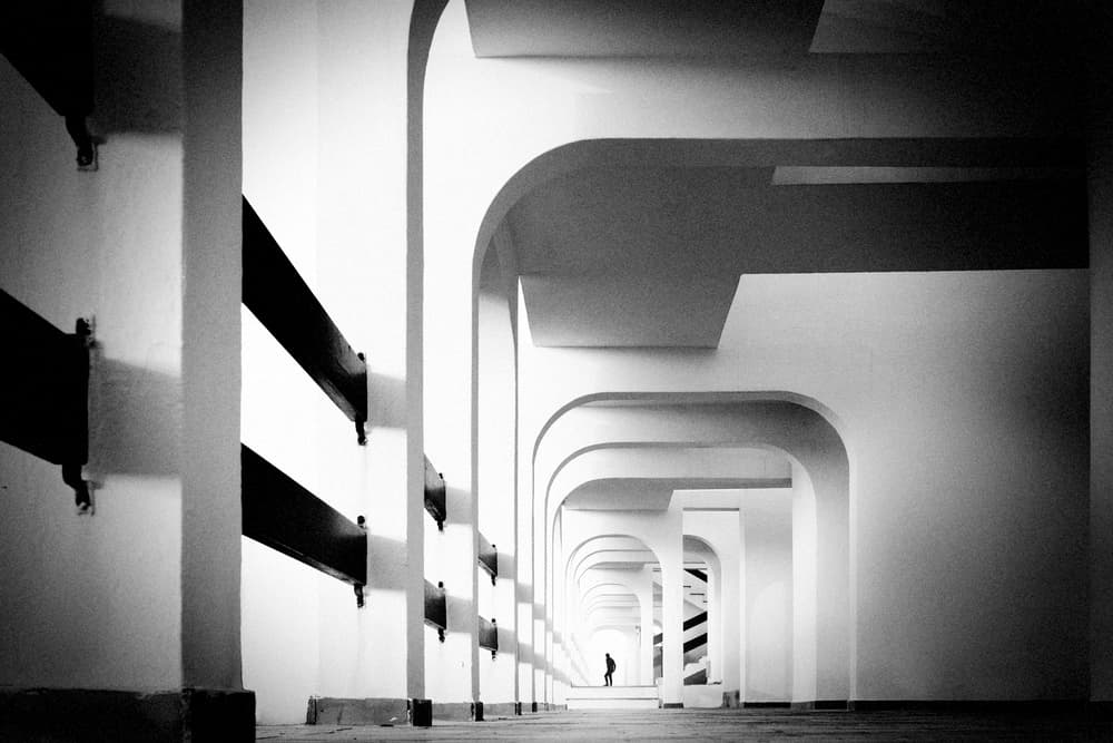 Arched Hallway Figure by Xavier Garci — canvas wall art