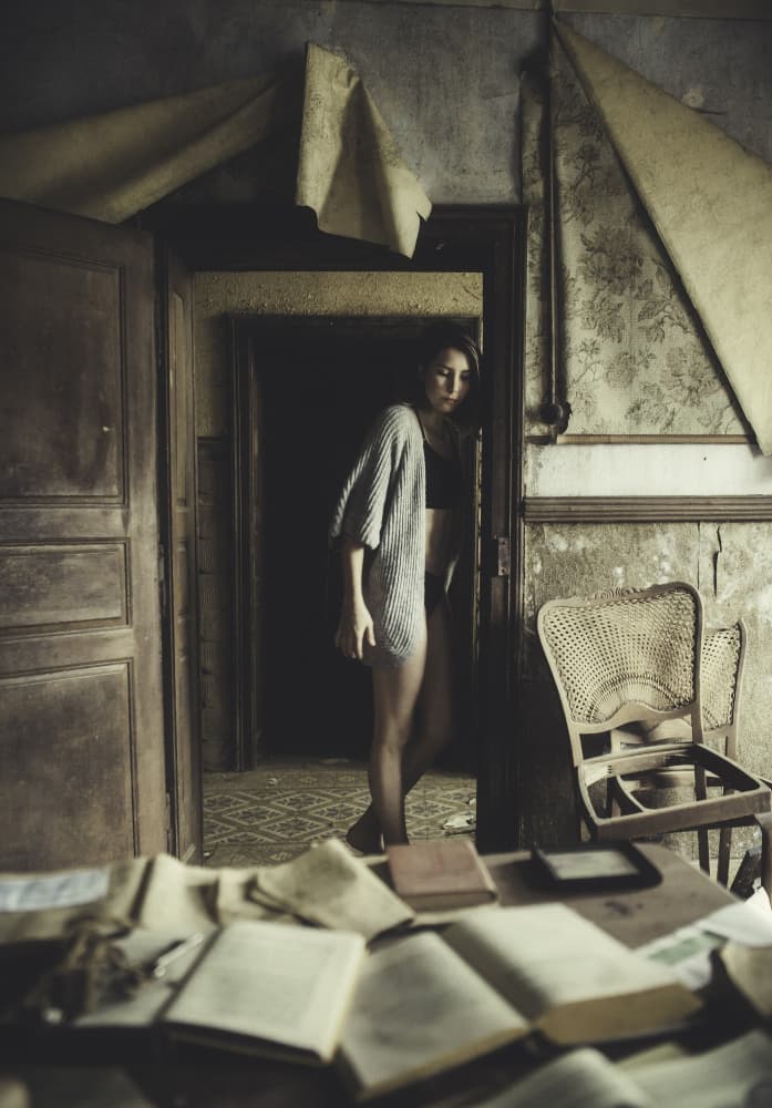 Pensive Woman Old House by Georgios Bero — canvas wall art