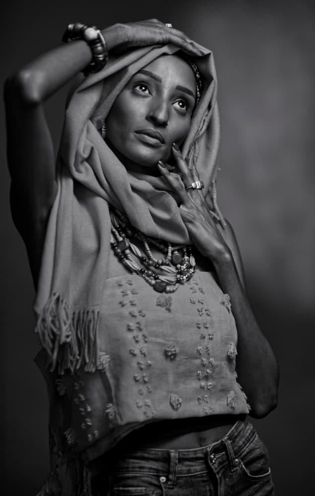 Pensive Woman In Scarf by Offer Ellbogen — canvas wall art