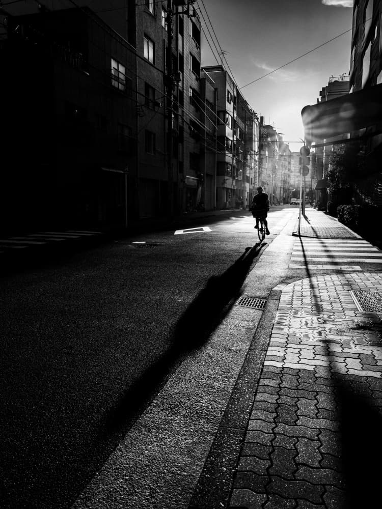 Urban Shadow Cyclist by Kenichiro Tsukada — canvas wall art