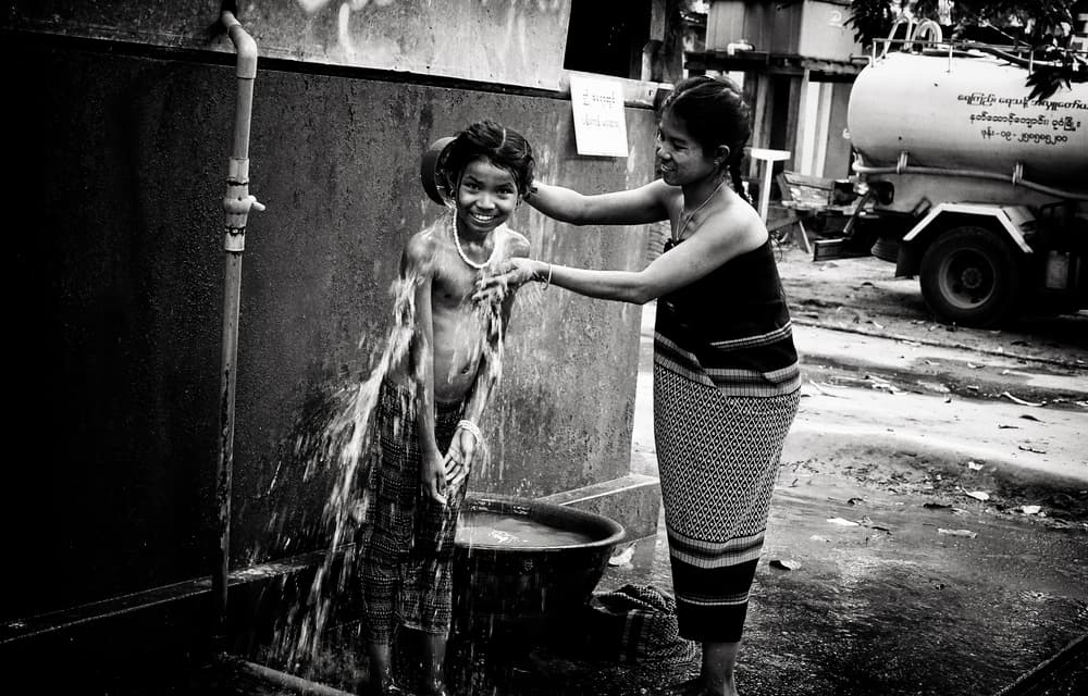 Smiling Child Bath by Elena Molina — canvas wall art