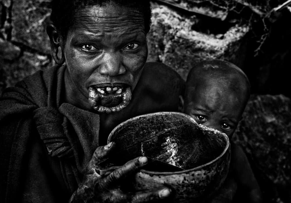African Mother and Child by Joxe Inazio Kuesta Garmendia — canvas wall art