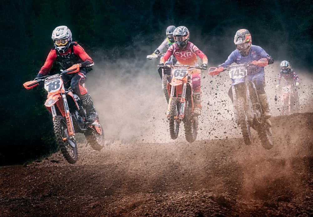 Flying Motocross Racers by Ben.C.L — canvas wall art