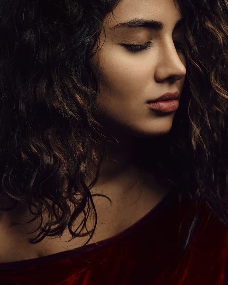 Serene Woman Profile by Mehdi Mokhtari — canvas wall art