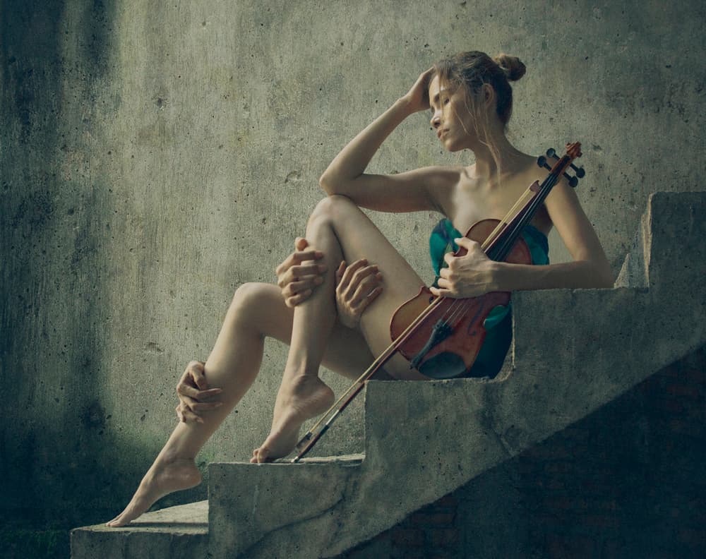Contemplative Violinist on Steps by Sebastian Kisworo — canvas wall art