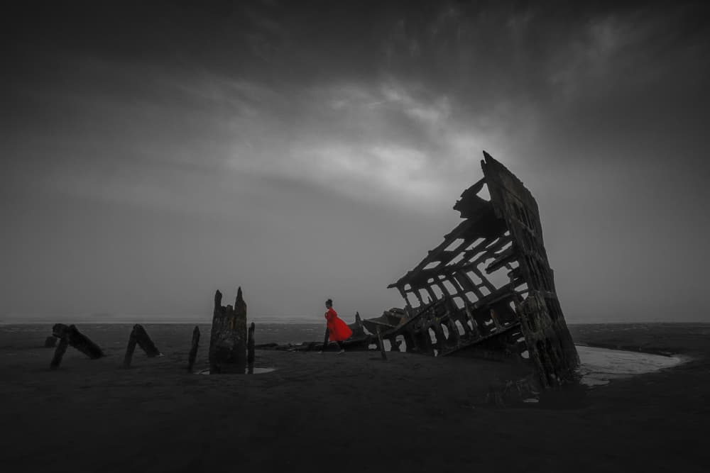 Red Dress Shipwreck Beach by Lydia Jacobs — canvas wall art