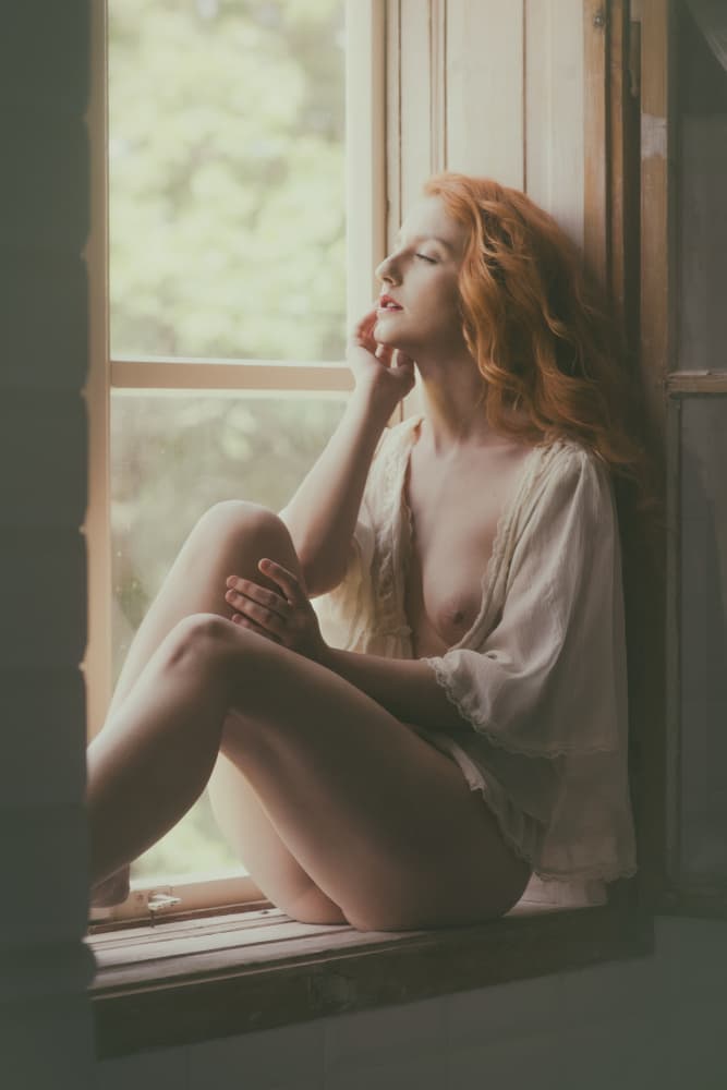 Quiet Redhead Window Moment by Christian Kurz — canvas wall art
