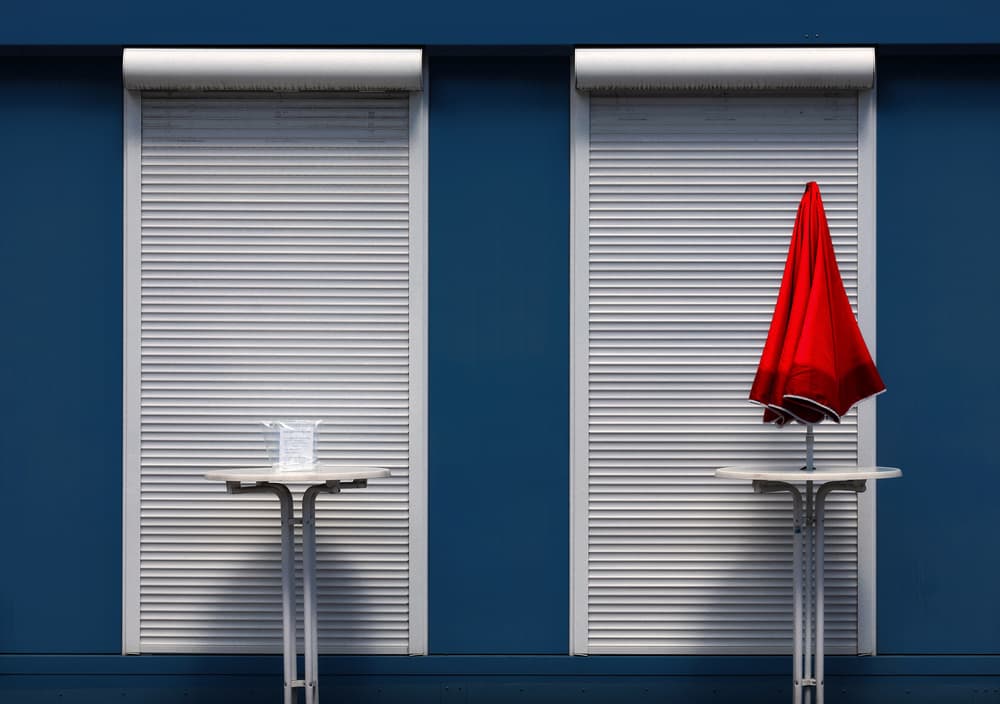 Red Umbrella Blue Wall by Hans-Wolfgang Hawerkamp — canvas wall art