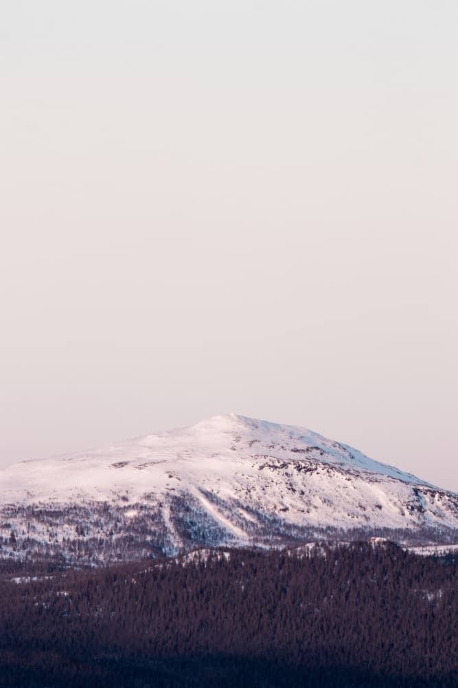 Serene Snowy Mountain by EMELIEmaria — canvas wall art