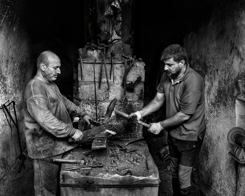 Blacksmiths At Work by Bashar Alsofey — canvas wall art