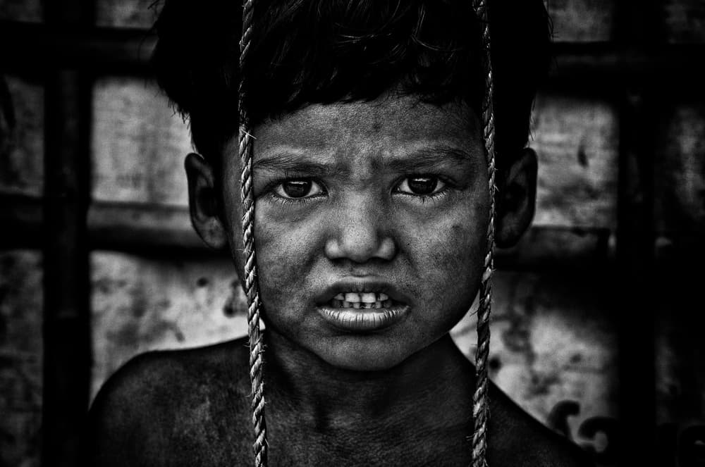 Defiant Boy Portrait by Joxe Inazio Kuesta Garmendia — canvas wall art