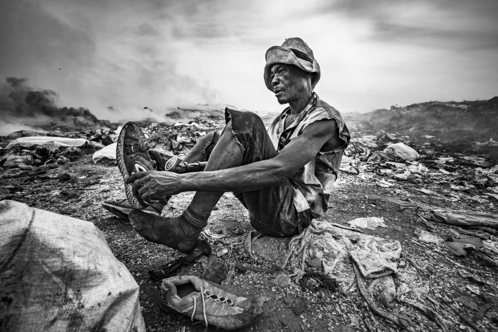 Landfill Worker's Resolve by João Coelho — canvas wall art