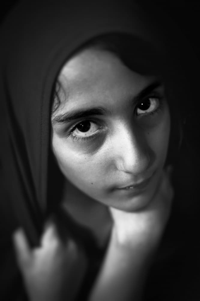 Pensive Hooded Portrait by Hazem Swidan — canvas wall art
