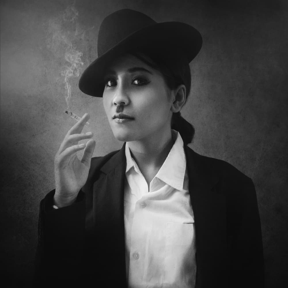 Confident Woman Smoking by Ivan Marlianto — canvas wall art