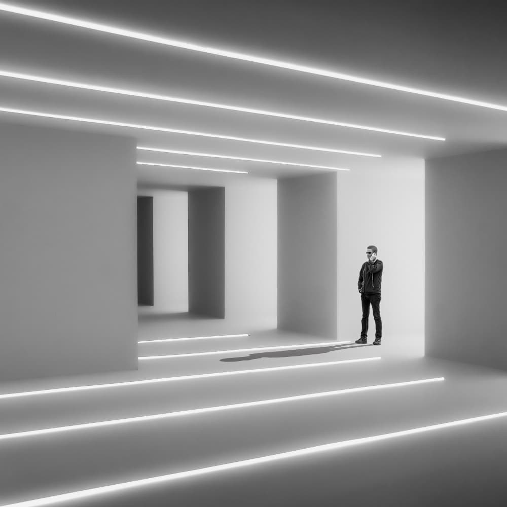 Lone Man Glowing Corridor by Luc Vangindertael (laGrange) — canvas wall art