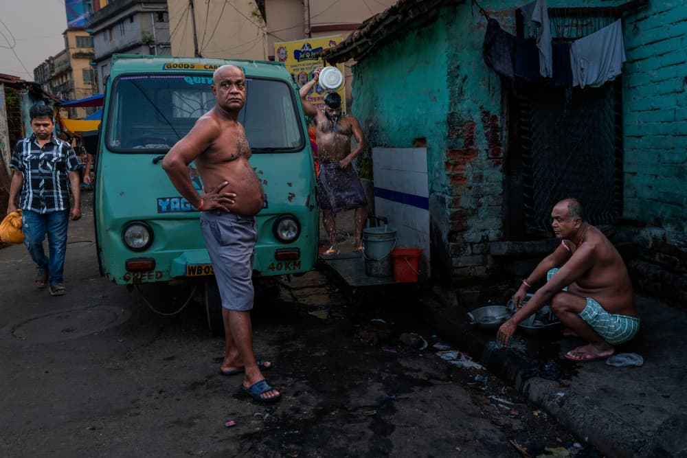 Daily Street Bathing India by Kuntal Biswas — canvas wall art