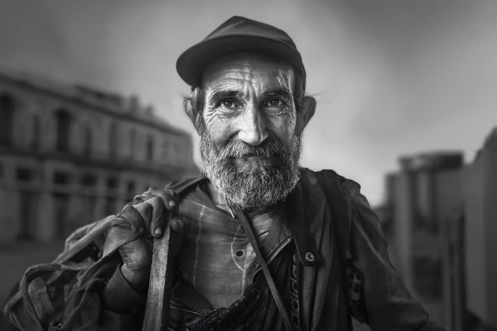 Smiling Man's Gaze by Leah Xu — canvas wall art