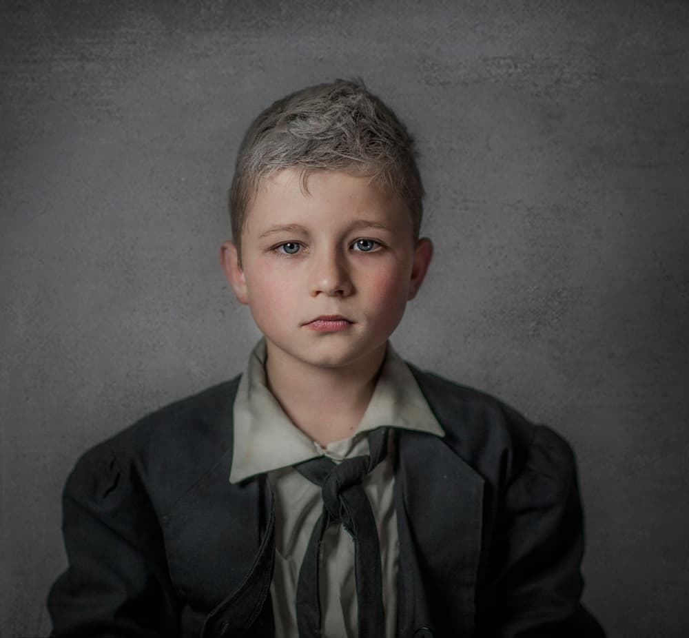 Thoughtful Young Boy Portrait by Monika Vanhercke — canvas wall art