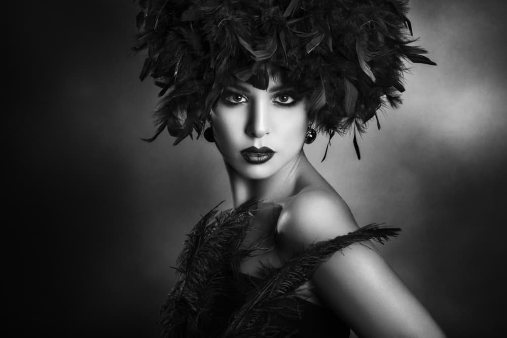 Dark Beauty In Feathers by Peppe Tambè — canvas wall art