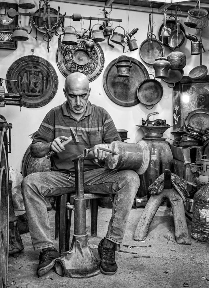 Copper Artisan At Work by Bashar Alsofey — canvas wall art